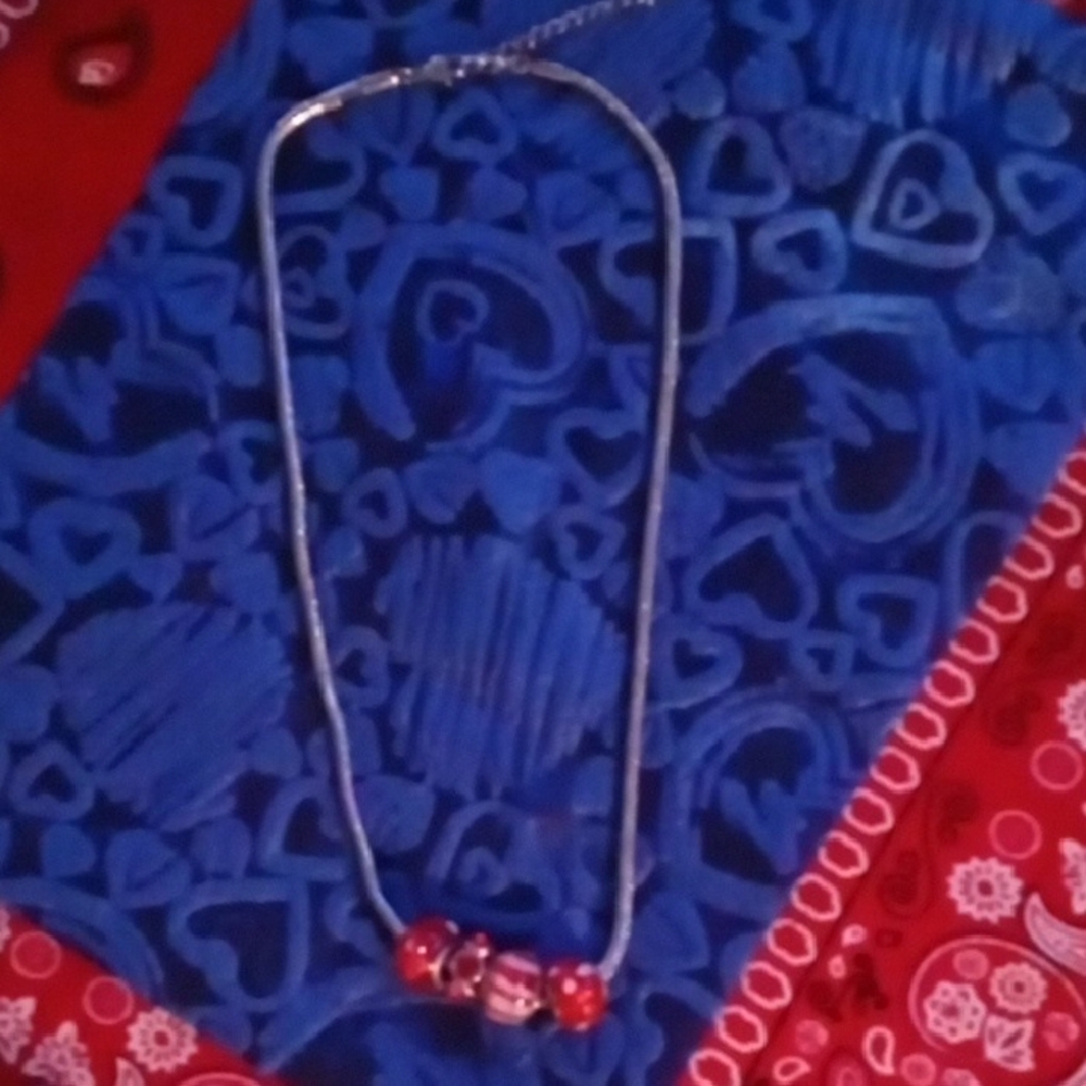 Elegant Silver Necklace with Red Beads